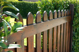 Wood garden fencing installed for backyard privacy