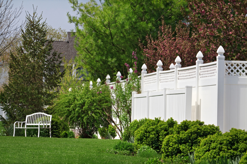 Tall luxury home fence installed around property