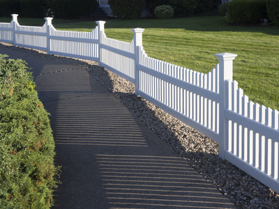 Vinyl fencing installed around open pasture & walkway